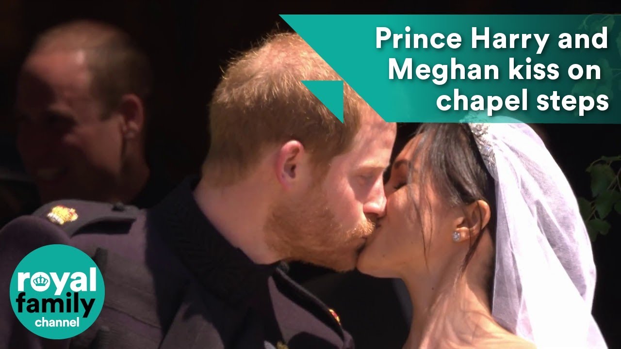 Prince Harry and Meghan Markle kiss on St. George's Chapel steps