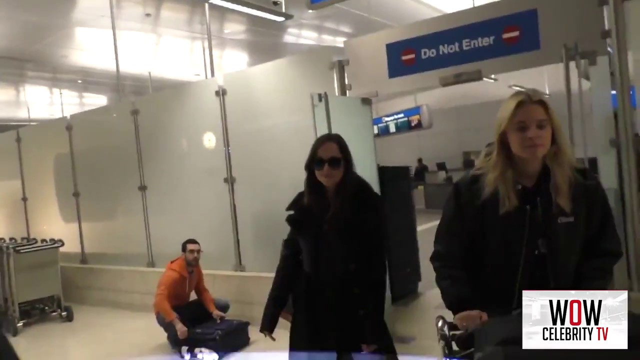 Dakota Johnson arriving at lax airport in Los Angeles