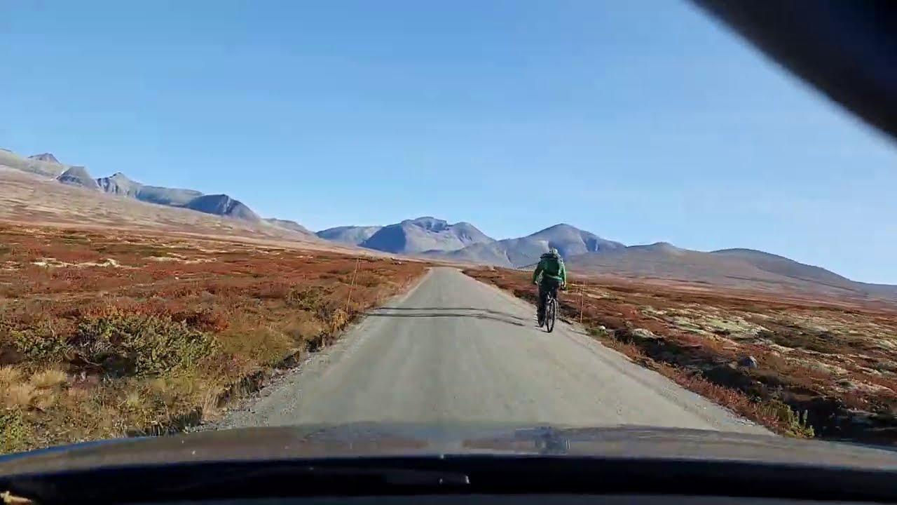 Driving in Rondane National Park in Norway with Autumn colors