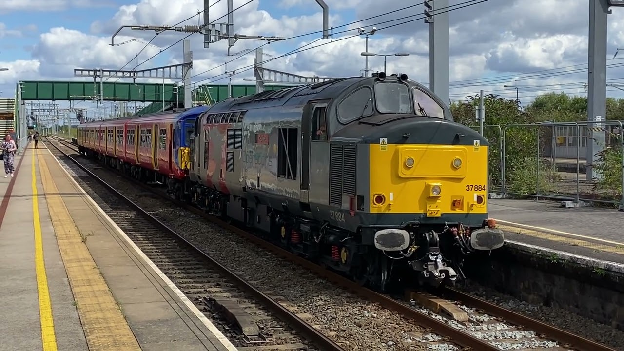 37884 Dragging the first SWR class 455 for scrap by rail At Severn Tunnel Junction