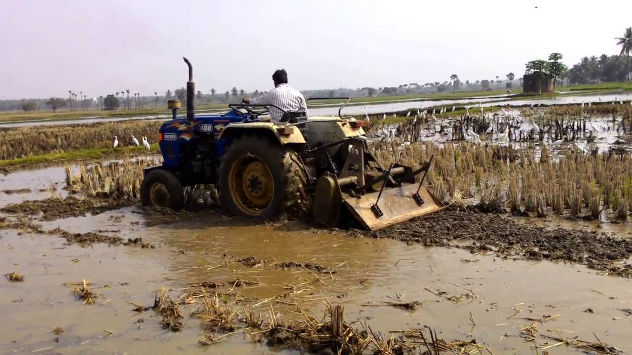 Eicher 480 model tractor with rotary tiller puddling
