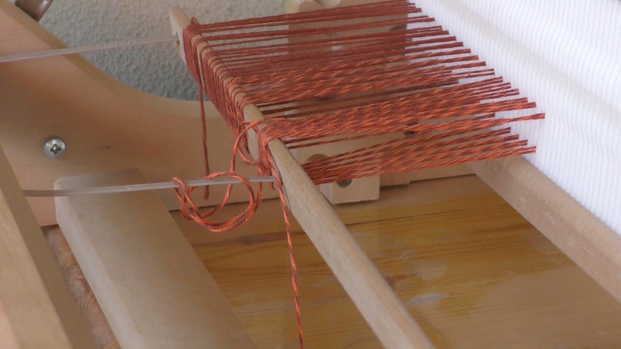 Dressing a rigid heddle loom - direct warping using a warping rod