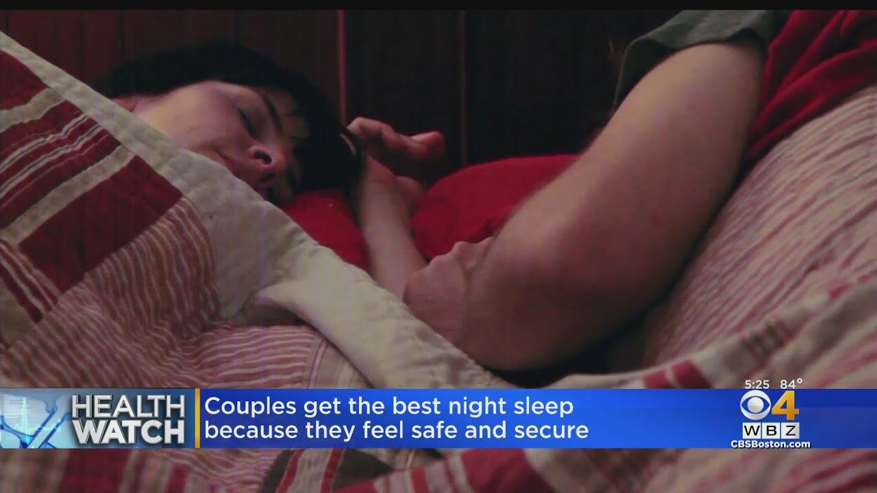 Do adults sleep better alone or with someone else in bed?