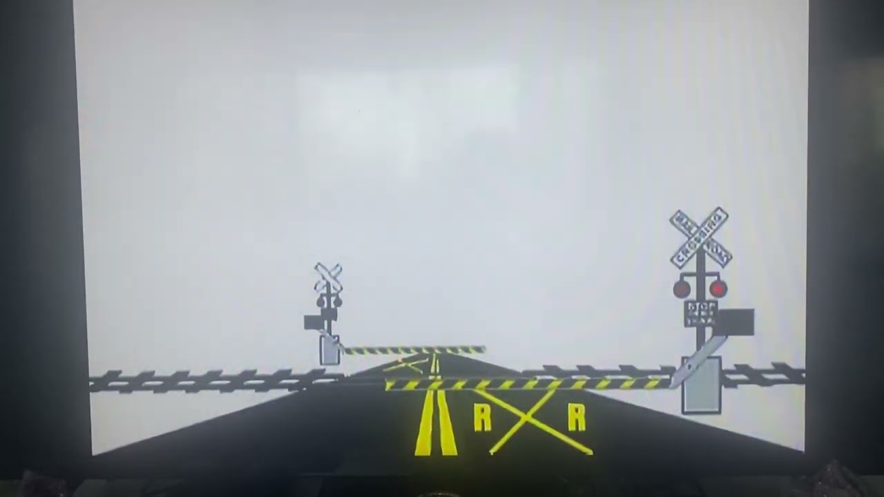 Union Pacific Freight train Passing through level crossing 