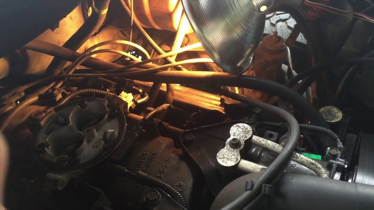 Руководство по замене датчика положения коленчатого вала на Dodge Ram 1500 5.9 (AUTO) 2001 года в...