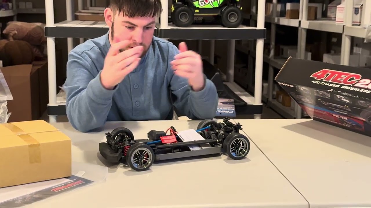 Reviewing and unboxing the Traxxas 4TEC 2.0  AWD CHASSIS  BRUSHLESS  AND WITH THE CADLIC BODY.