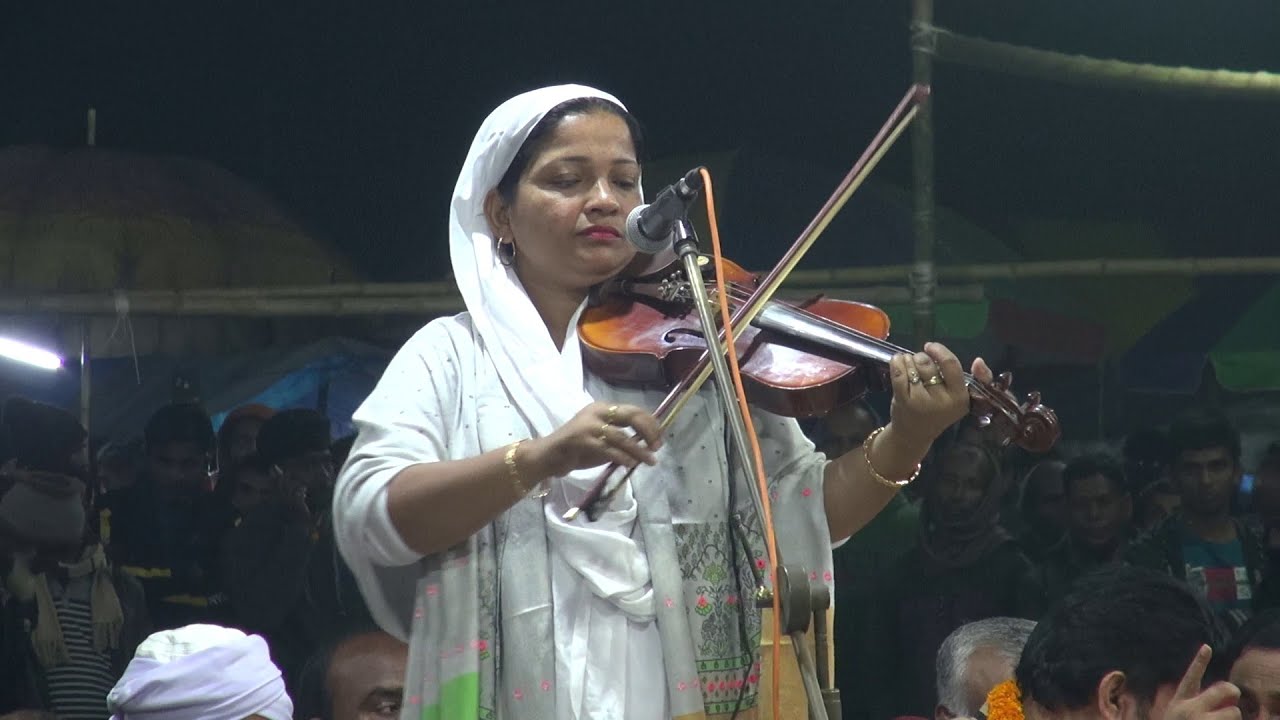 বাসাইল টাঙ্গাইল থেকে বাউল গানের আষর লাইভ গান পরিবেশনায় মিরাজ দেওয়ান ও তানিয়া দেওয়ান।