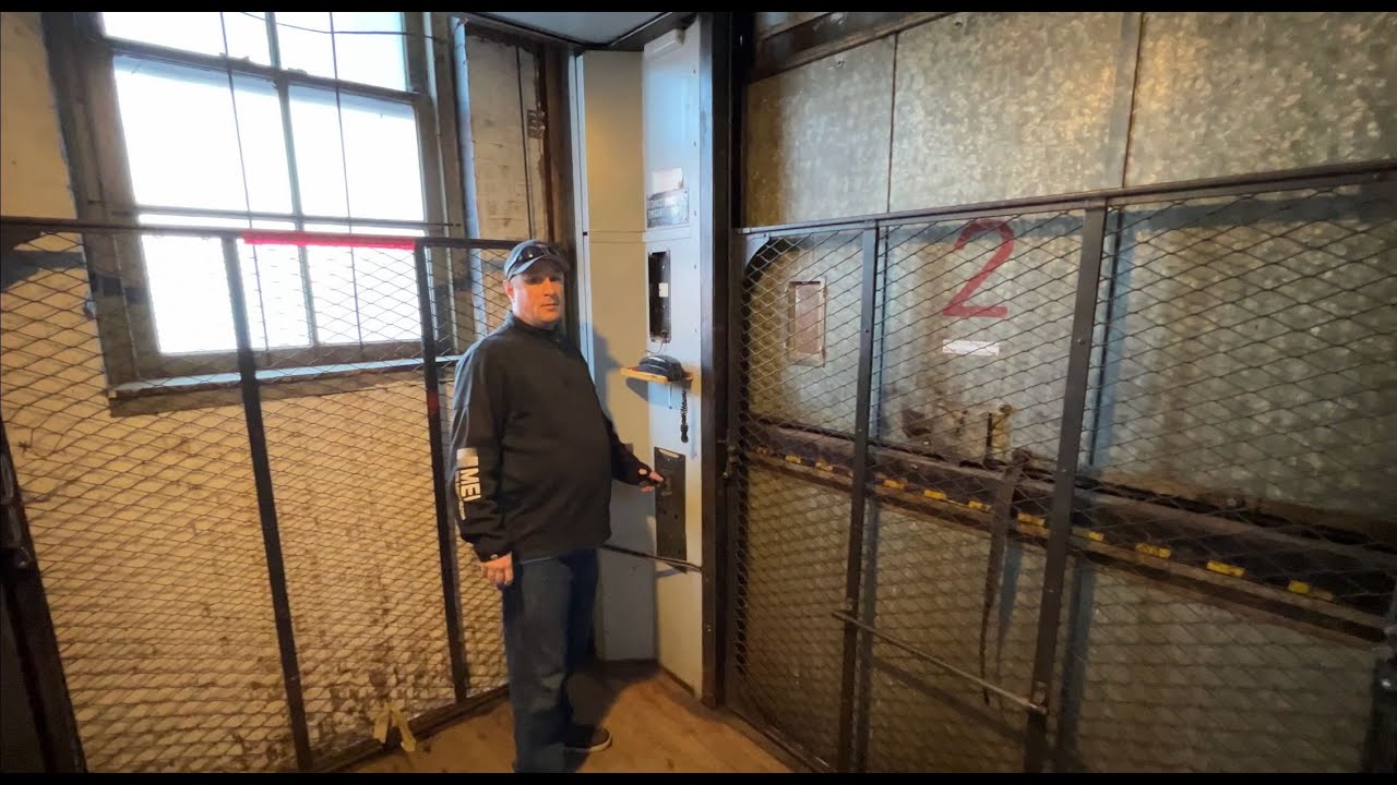 Rochester, NY: 2 old OTIS Elevators in a Warehouse