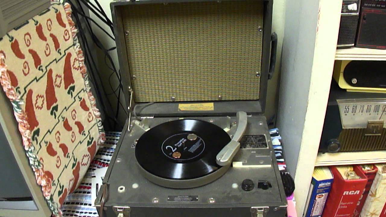8 RPM record on talking book player.