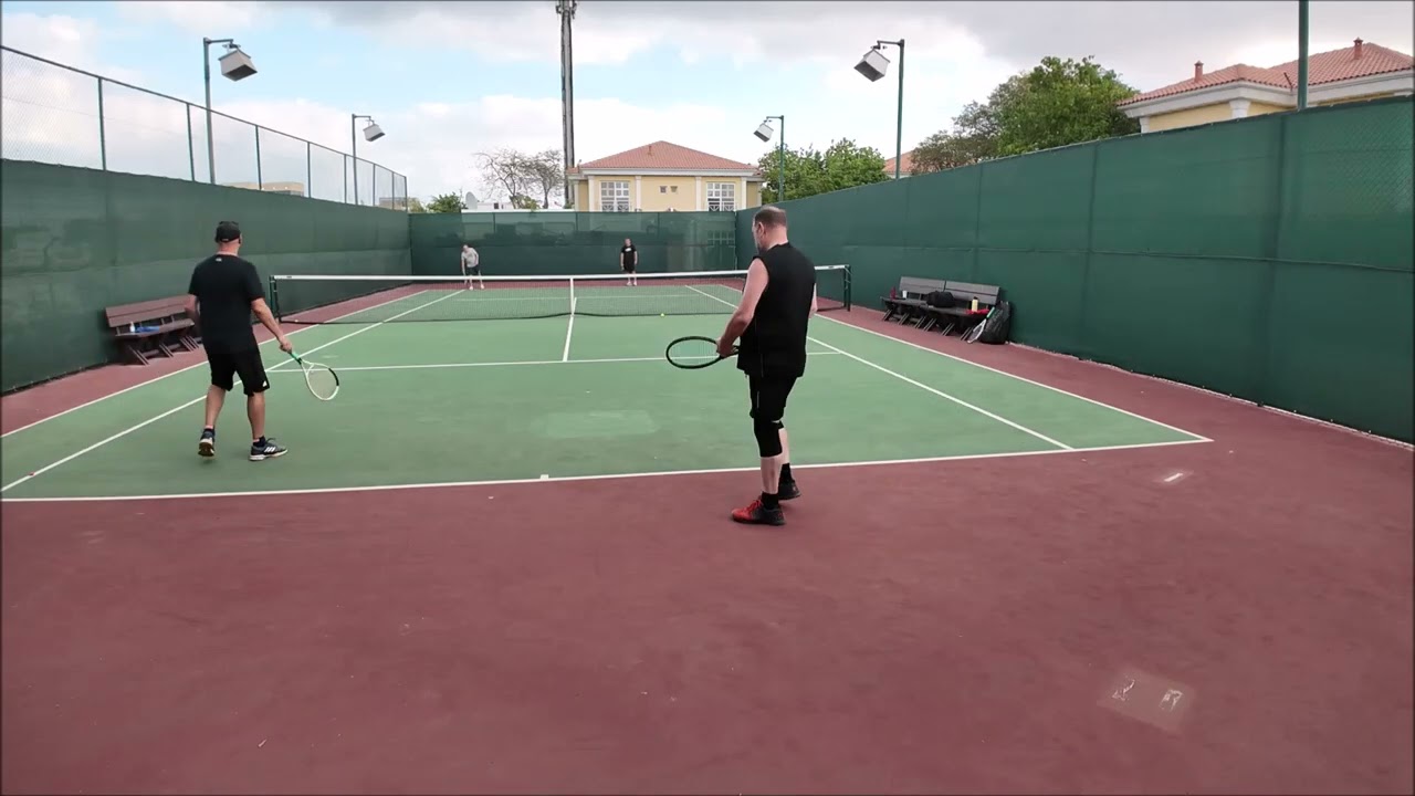Over 50 in Dubai, playing tennis.