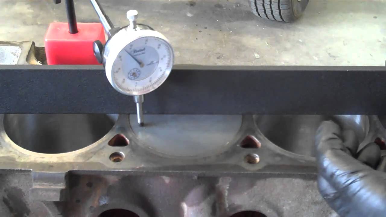 Checking piston to block deck clearance.MP4