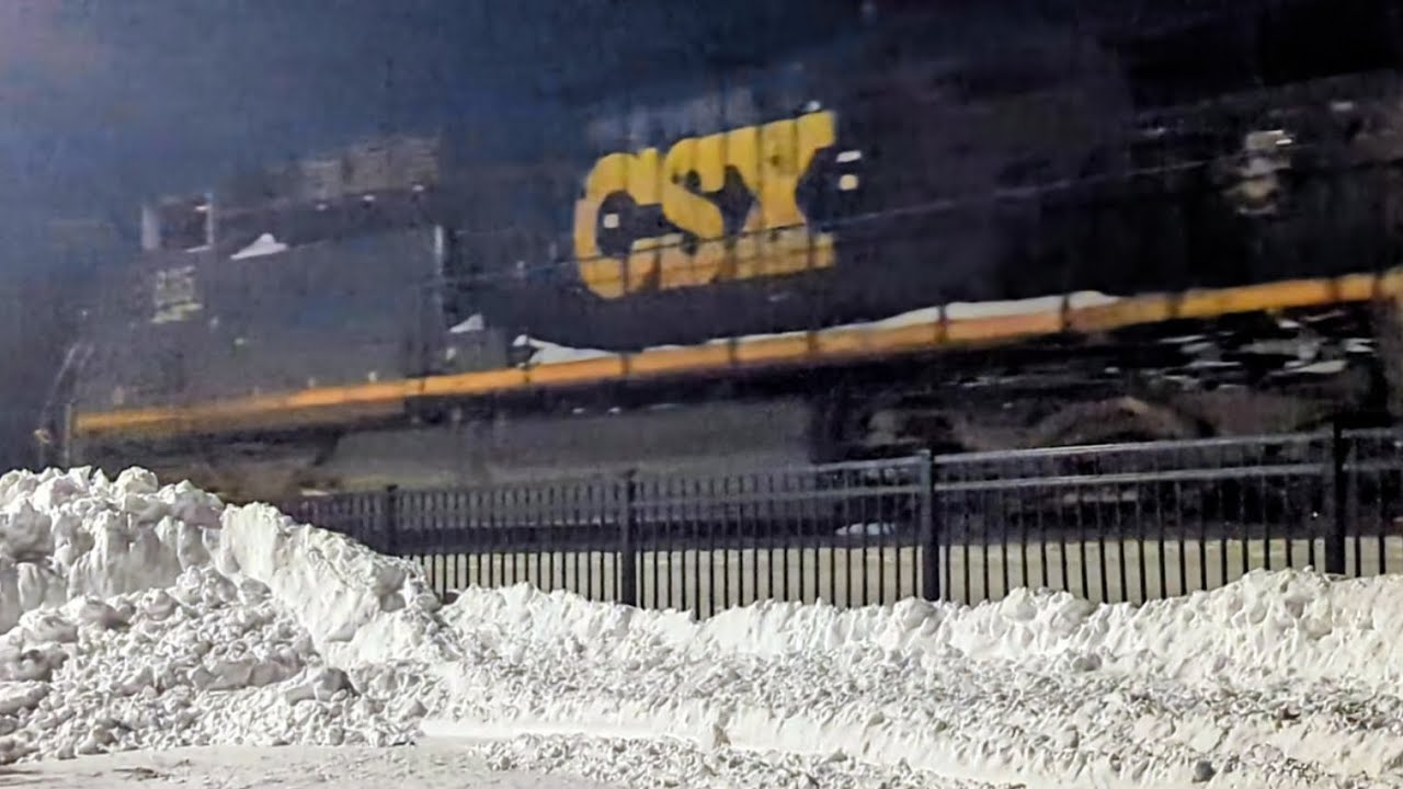 Southbound CSX mixed manifest with mid-train DPU on track two 