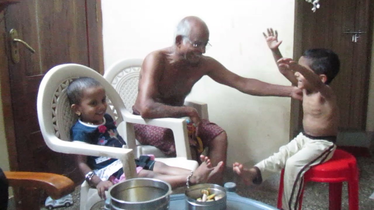 Achu and Kuttu story telling session to Achachan 