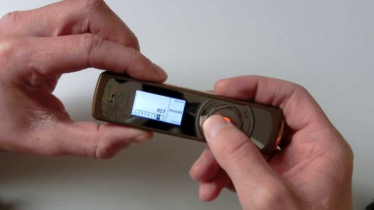 Nokia 7380 Akku wechseln und Staub entfernen