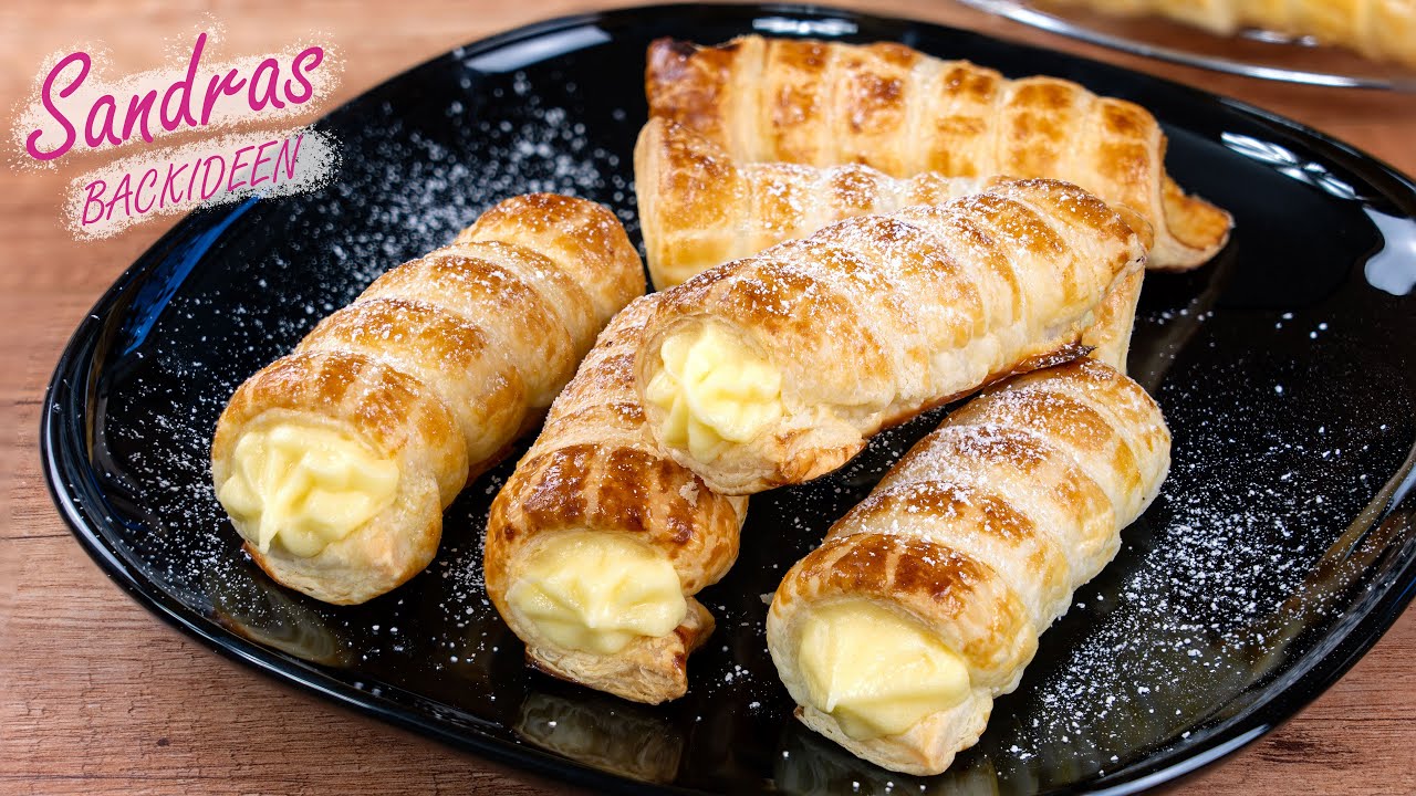 Blätterteigröllchen mit Eierlikör-Puddingcreme - knusprig und cremig | Schillerlocken