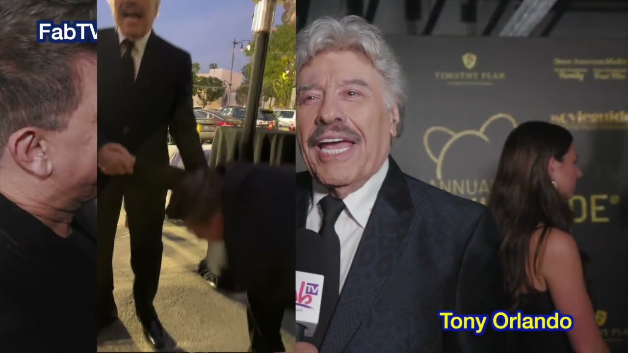 Singer Tony Orlando drops TV host to the ground!!!  Arm wrestling???