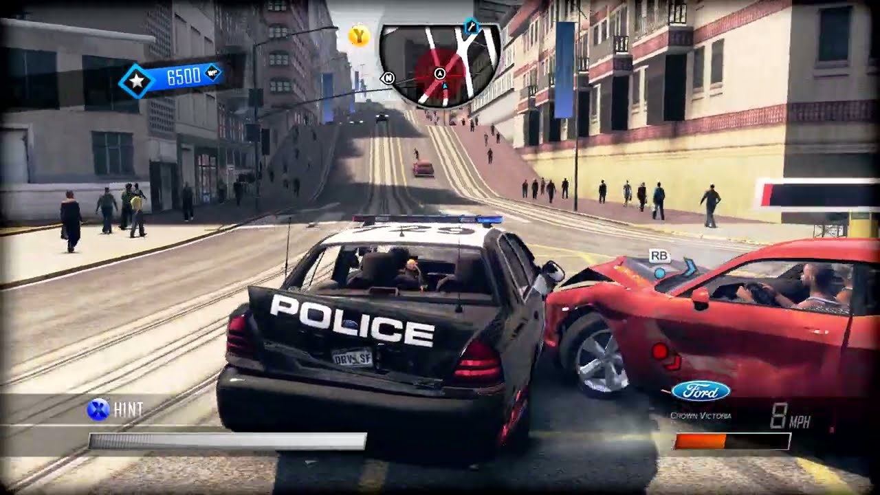 Ford Crown Vic Police Units in a Chase After a Red Dodge Challenger
