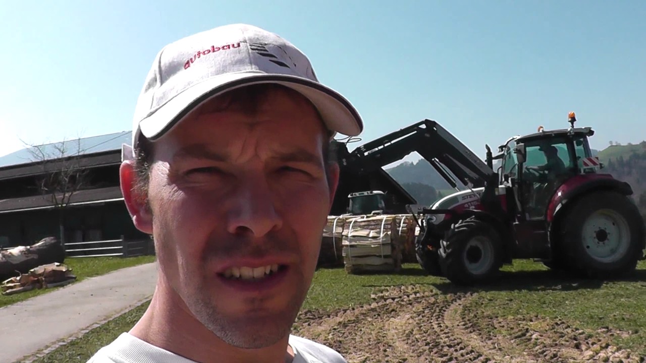 Brennholz stapeln mit Steyr Traktor und Frontlader