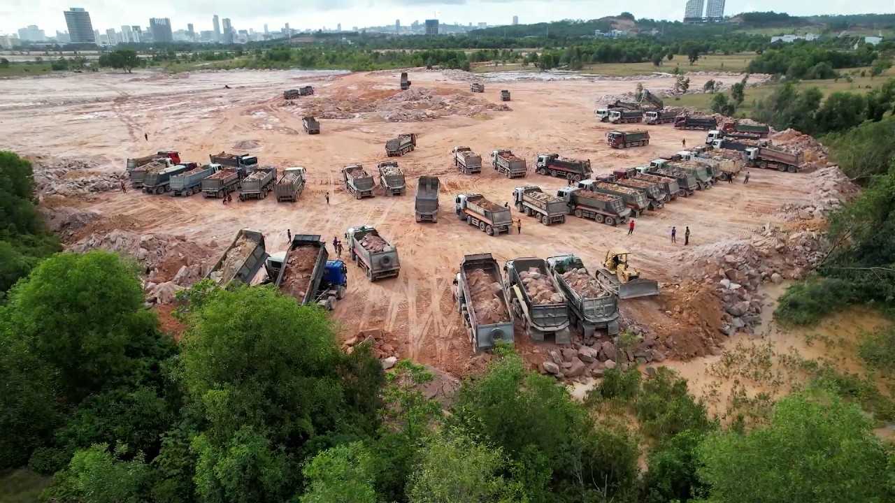 Perfectly Large Size Landfill by Trucks & Komatsu Dozer Moving Stones With Terrible Dirt For Fill
