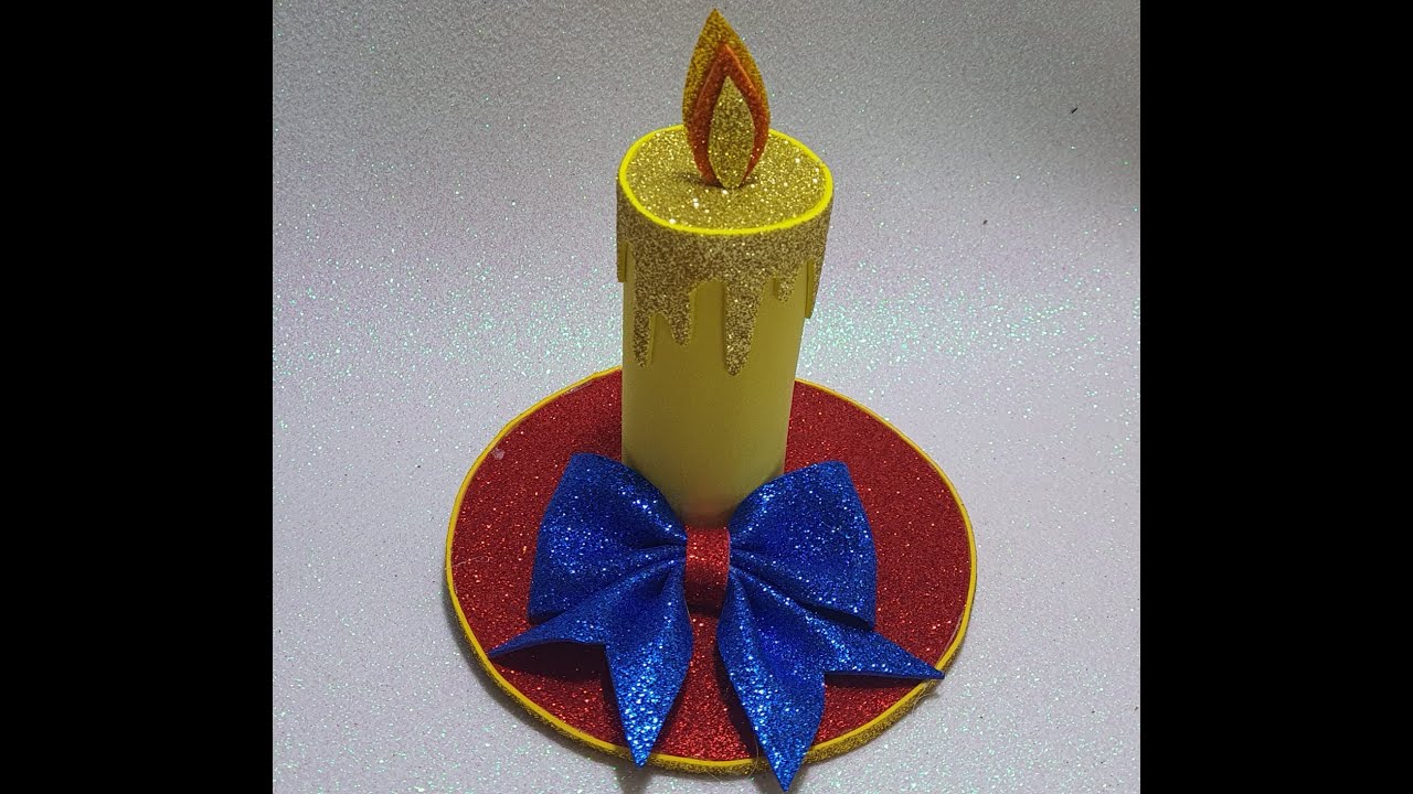 vela de Natal com E.V.A e rolo papel higiênico.
