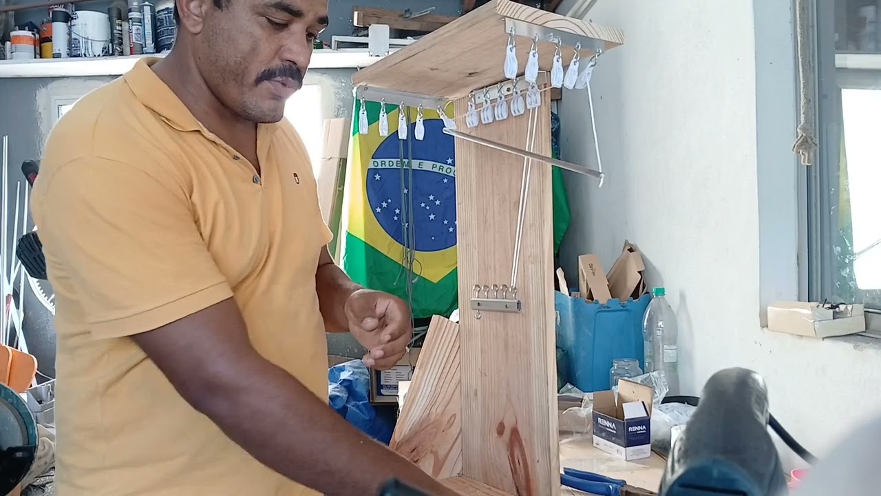 Instalação de varal de teto com três peças