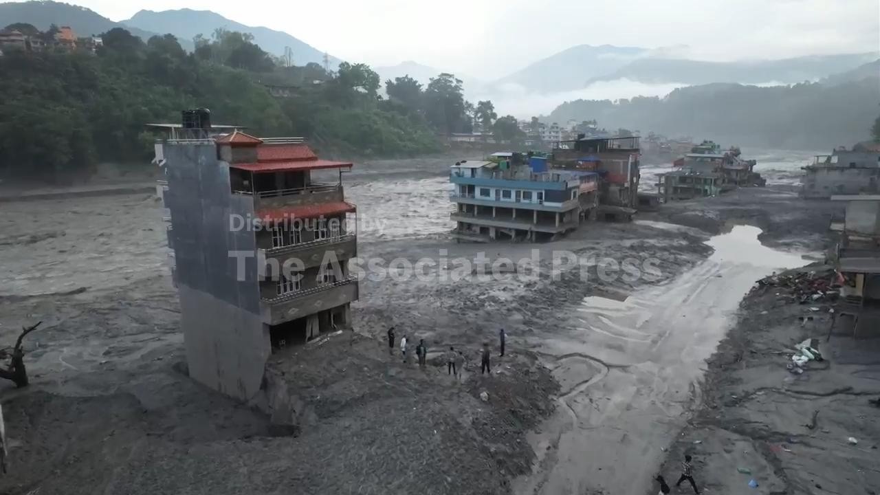 Aerials from Nuwakot, Nepal in aftermath of devastating flash floods shows river swelling