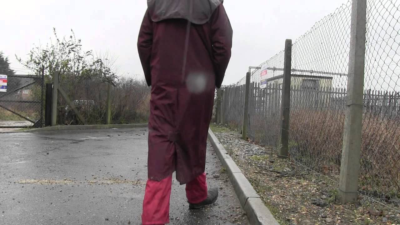 Wearing a Red coat and souwester in the rain