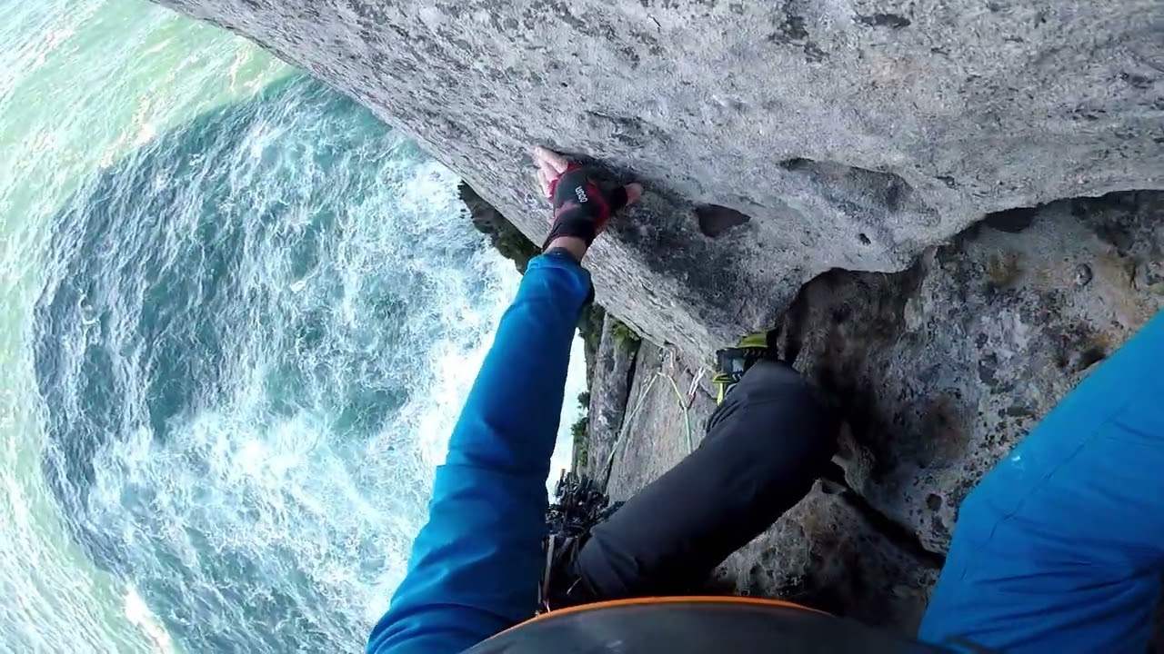 Trad climbing The Crack (10) at Point Perpendicular