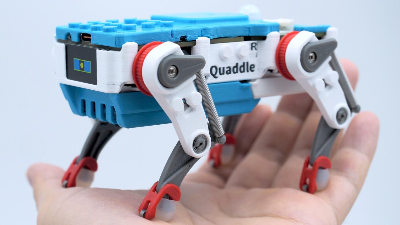 Quaddle Talks Back: A Programmable Desk Robot That Backflips & Walks Ceiling - Open Source Robot Kit