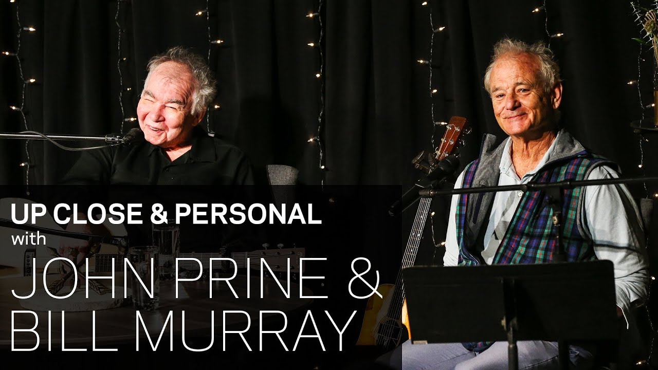 John Prine & Bill Murray Discuss Their Early Days Of Music, Comedy & More