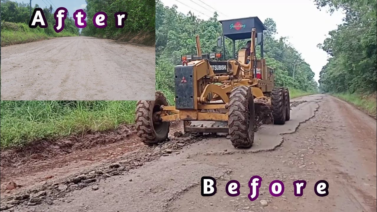 Motor Grader Crushes Cracked Asphalt For Road Repair Old