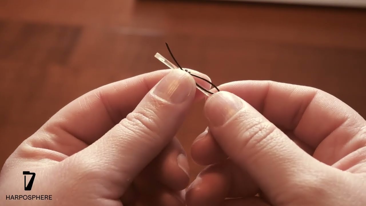 Comment faire un nœud pour changer une corde de harpe ?