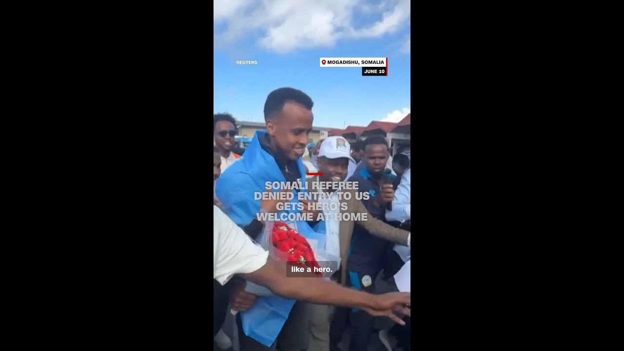 Somali referee denied entry to US gets hero's welcome at home