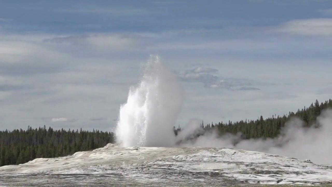 Old Faithful Lodge and Geyser Yellowstone National Park