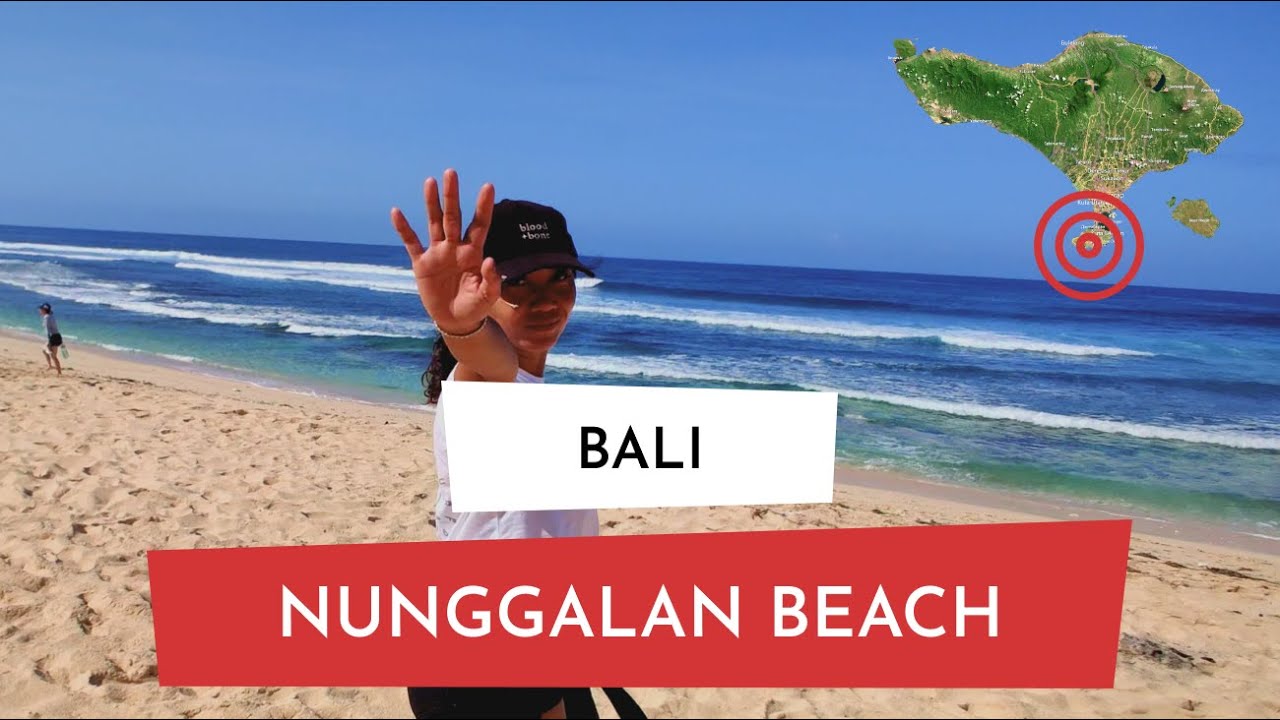 Bali. Nunggalan beach. Local balineese girl shows secret beach in Uluwatu.