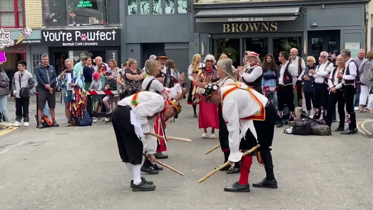 Morris dancing! English folk dance based on rhythmic stepping & execution of choreographed figures.