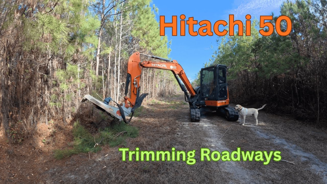 Trimming limbs at the Farm   Hitachi 50 rotary cutter