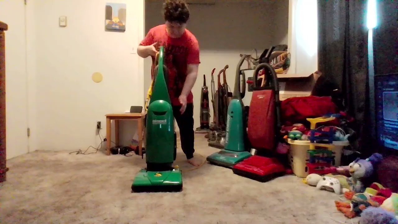 vacuuming the bedroom with 2025 bissell big green commercial bgu1451t