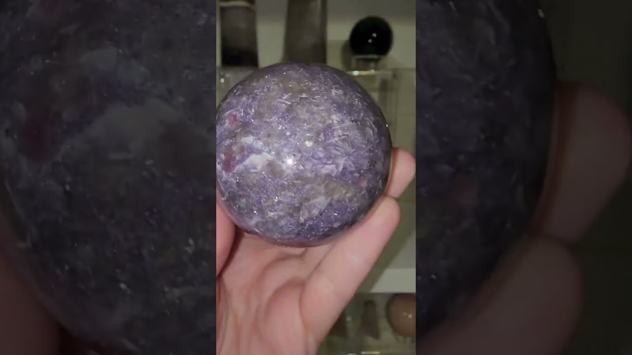 Unicorn Stone Sphere! Such a cool mix of lepidolite, pink tourmaline, and smokey quartz.