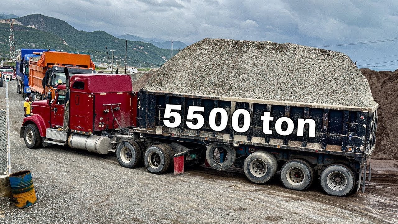 Trucks are unloading 5,500 tons of materials onto the barge S7:E5