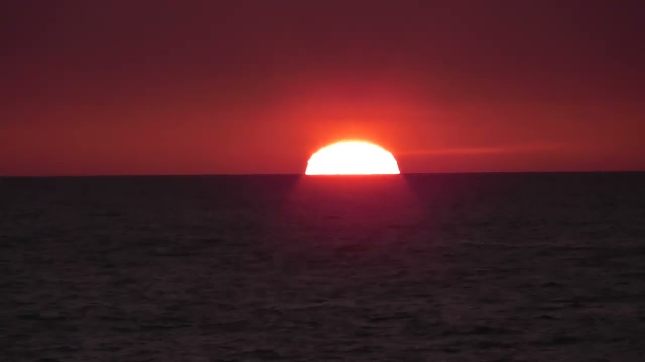25.7.12  夕陽に見る