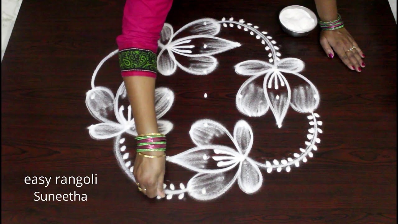 Cute n bright lotus rangoli kolam arts by Suneetha || easy n simpe muggulu