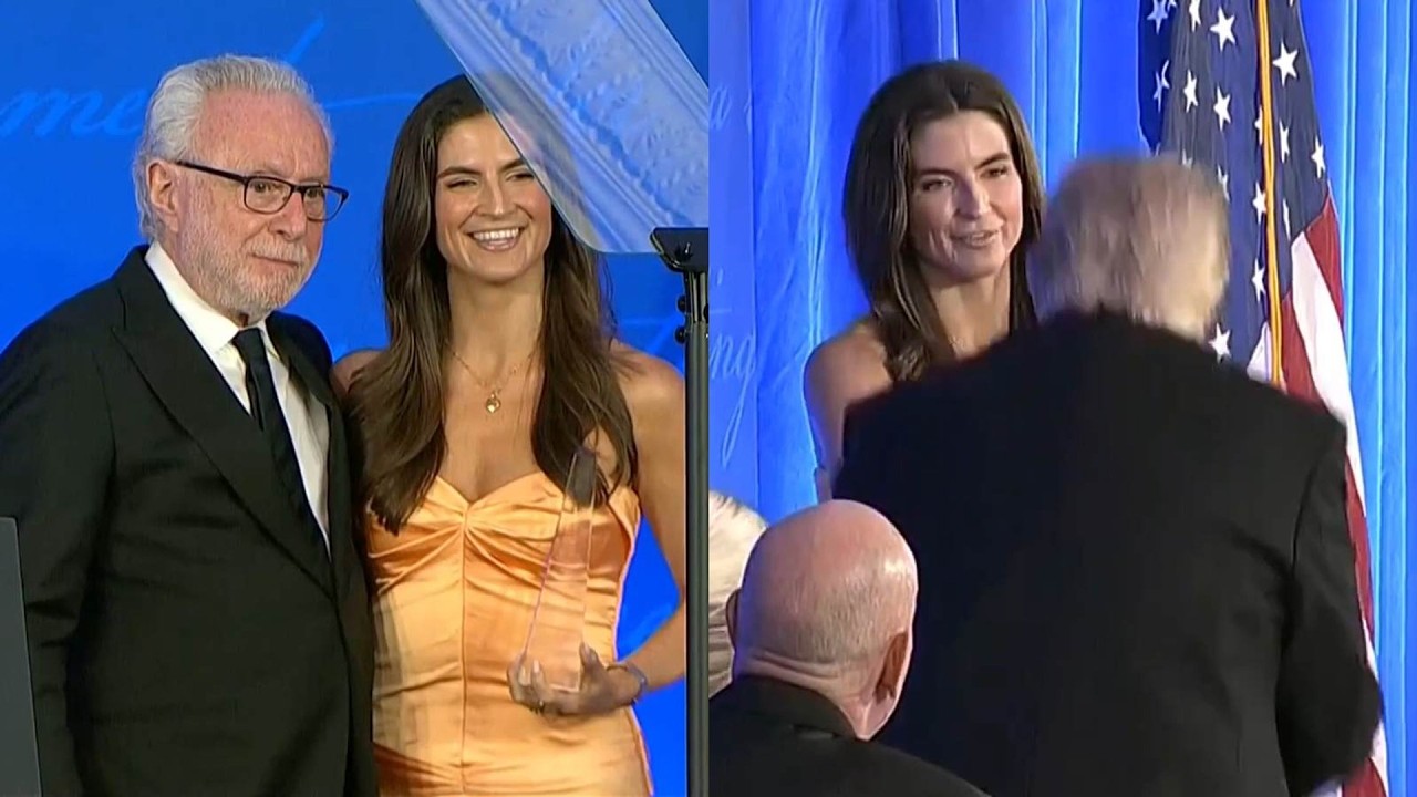 Kaitlan Collins shakes Trump&rsquo;s hand after receiving award at WHCD
