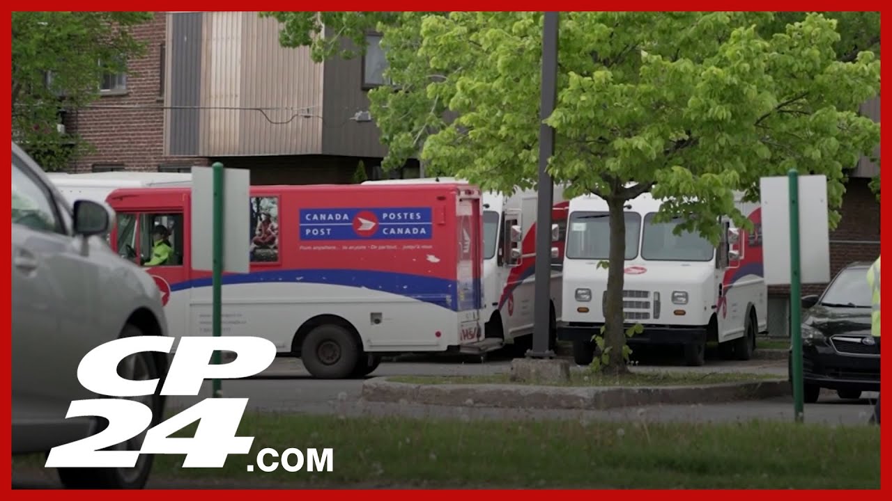 Striking Canada Post workers back on the picket lines ahead of a demonstration