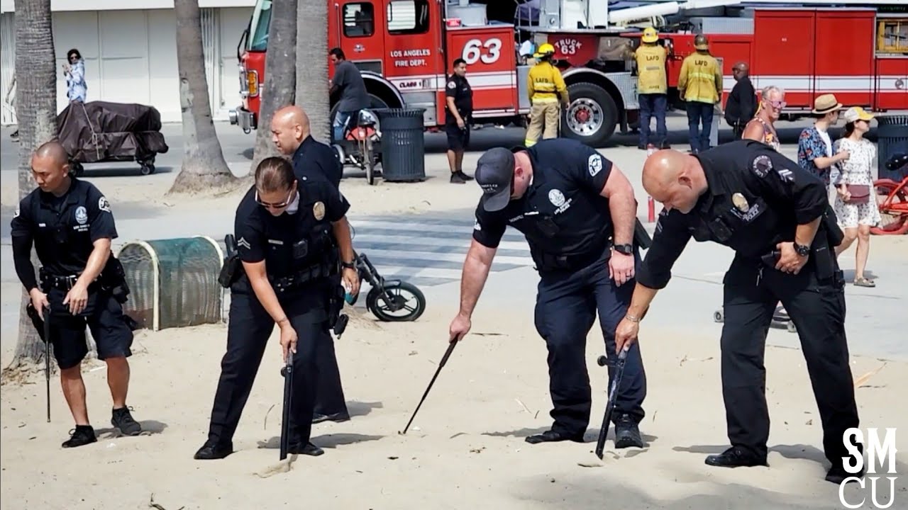 Los Angeles Police Officers and Firefighters Search for Evidence in Venice