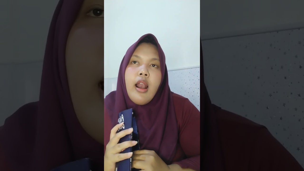 review buku DYAH ANNISA XII-A