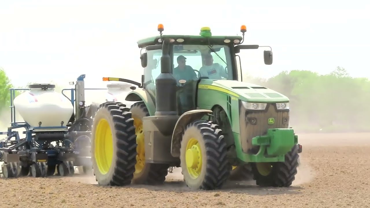 Opposing companies working together to plant soybeans