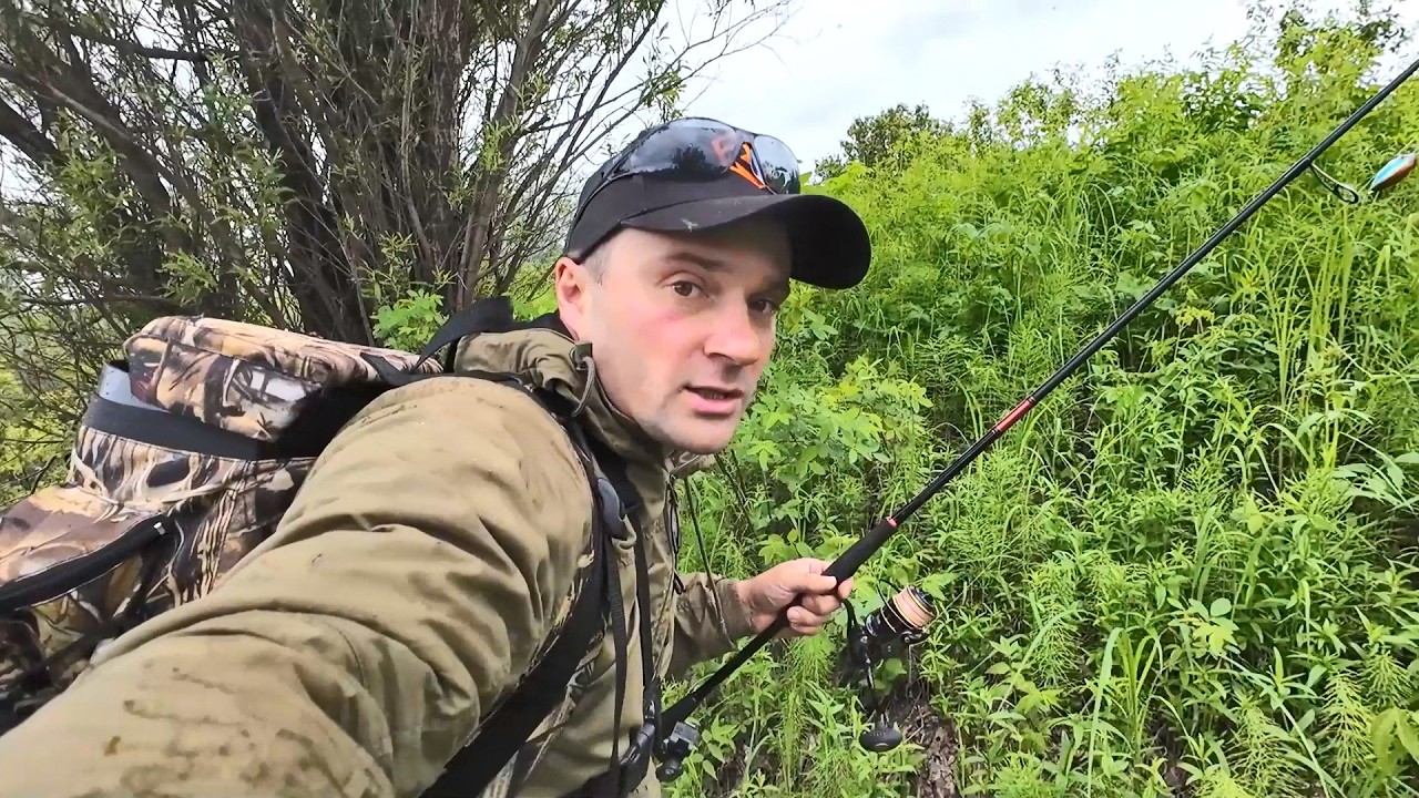 Stream fishing with spinning rods. Fresh fish for the table in the form of pike. Enduro motorbike...