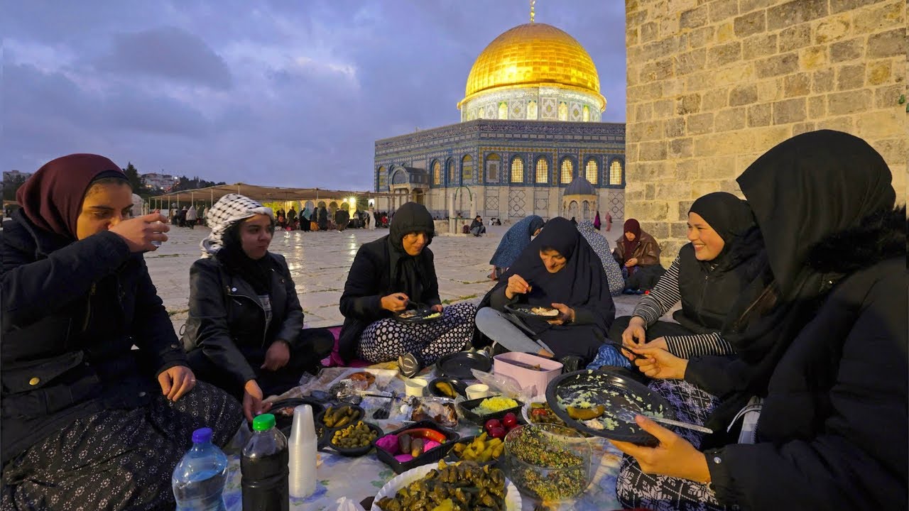 Palestinian worshippers gather for Ramadan iftar at Al AQSA Mosque