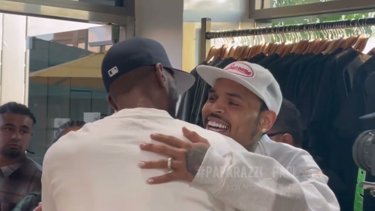 Chris Brown Greets Fans at Cool Kicks in Los Angeles